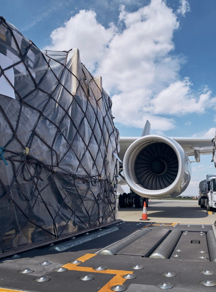 Loading of cargo containers to airplane