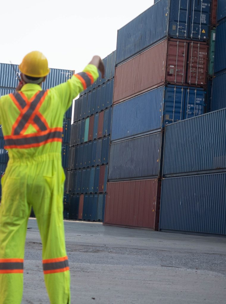 Male man safety helmet hardhat yellow orange color cheerful cargo logistic shipping technology engi Male man safety helmet hardhat yellow orange color cheerful cargo logistic shipping technology engi